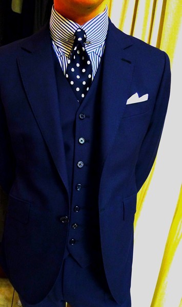 navy blue suit with light blue shirt