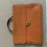 Tan leather briefcase