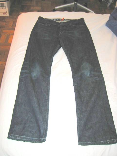 I thought I'd post a couple of pics of my ES Fultons. I guess I got this pair about 8 months ago, and have been my favorite jeans ever since. It is a dry denim, and these have not been washed.